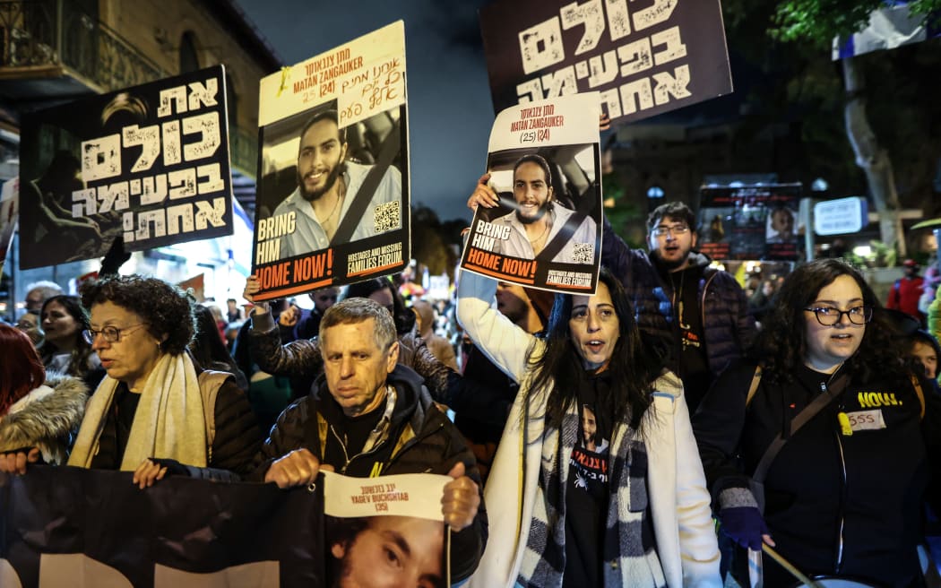 Families of Israelis held hostage in Gaza and supporters protest for the release of hostages held in Gaza outside the home of Minister of Strategic Affairs Ron Dermer in Jerusalem, Israel, on April 13, 2025. (Photo by Saeed Qaq/NurPhoto) (Photo by Saeed Qaq / NurPhoto / NurPhoto via AFP)