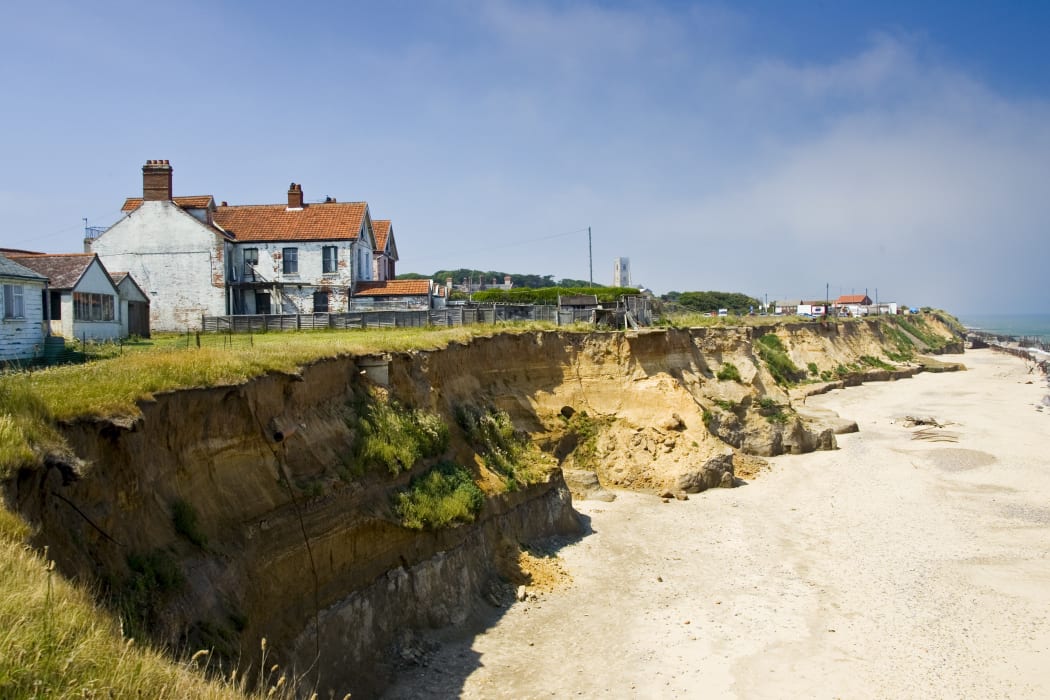 Eroded shoreline at Happisburgh, Norfolk, United Kingdom.