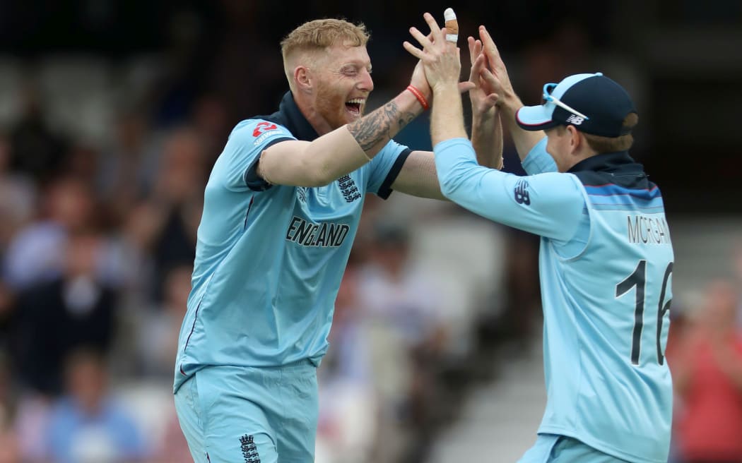 England's Ben Stokes celebrates with captain Eoin Morgan.