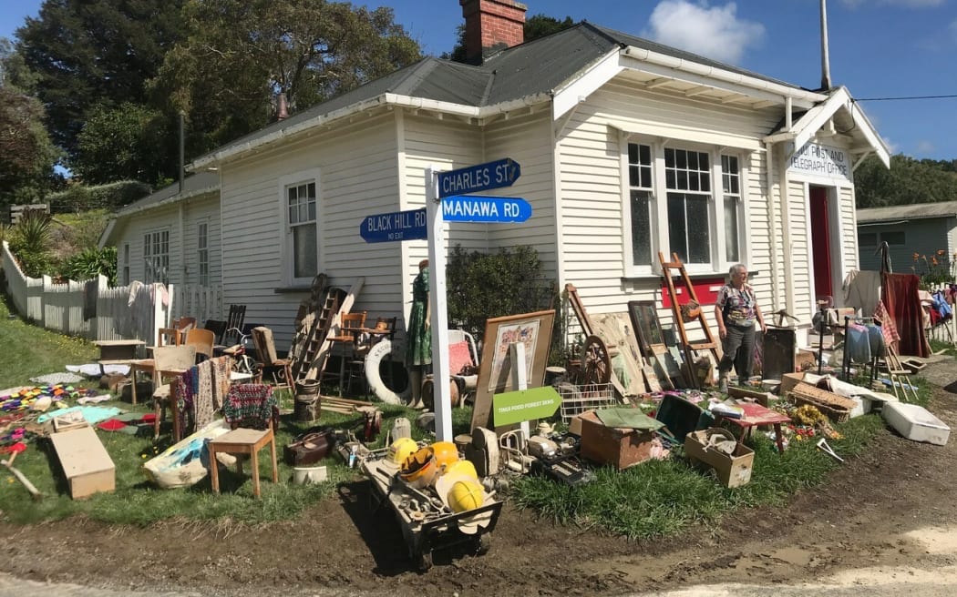 Flood-damaged items on the street in Tinui.