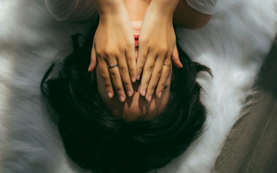 girl with hands on face