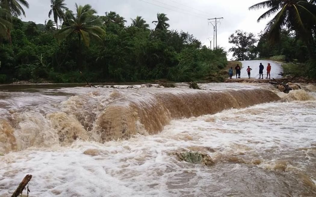 A creek in North Efate has rendered the ring road temporarily impassable. It's designed to handle overflow, but water volumes are unsafe.
