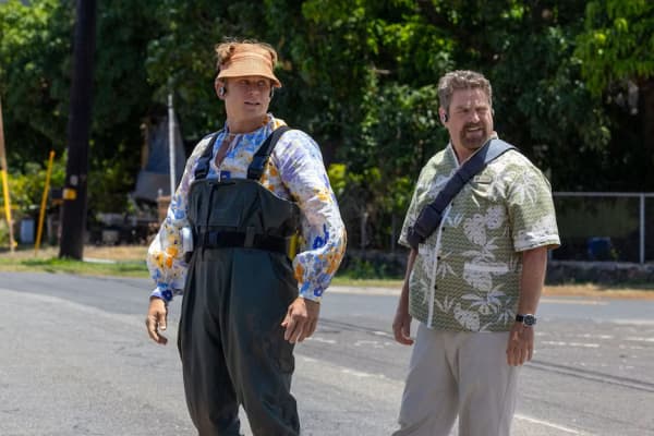 Jumba (right) and Pleakley (left) wear slightly more convincing human disguises in the live-action version.