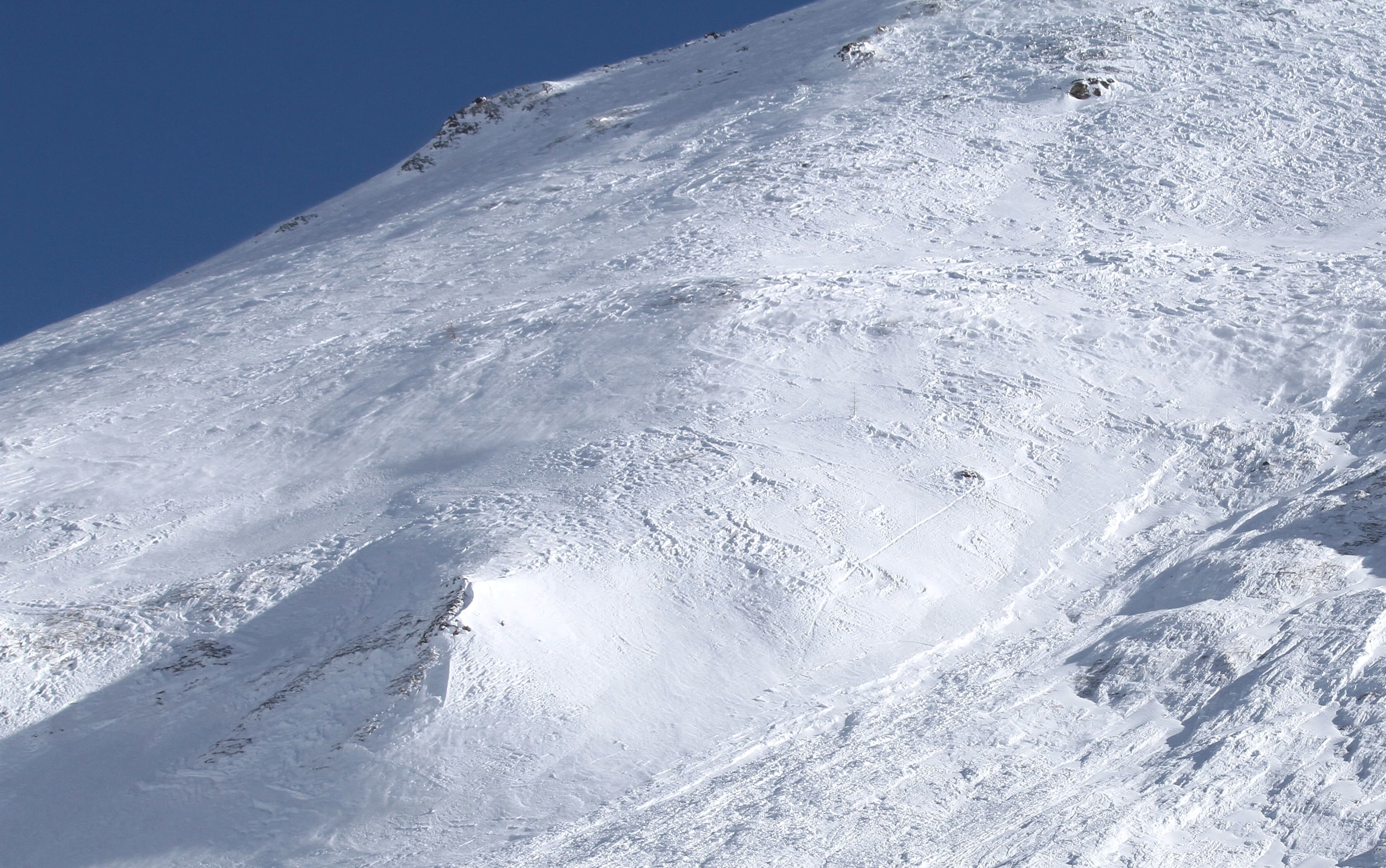 This image of the French Alps shows an avalanche site in an off-piste area after an avalanche engulfed nine people, killing at least four.