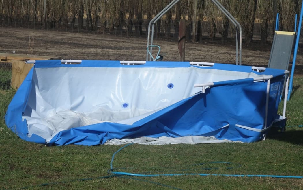 Glen Smith ripped open this swimming pool to try to save his house.