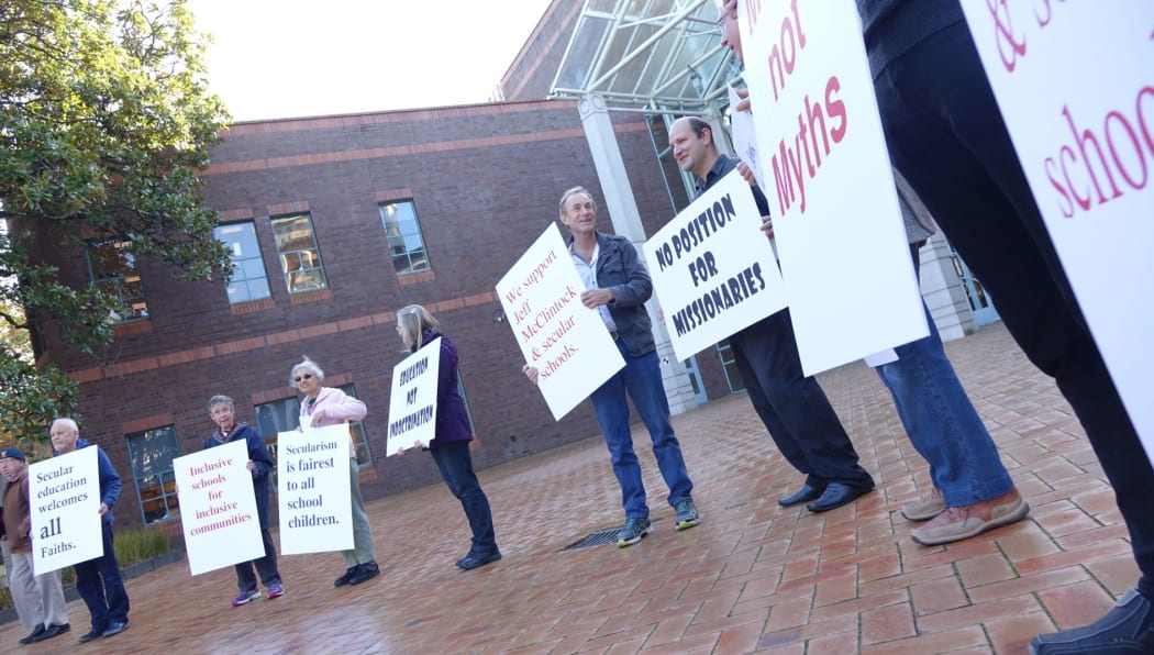 Secular Education Network protestors outside Auckland High Court.