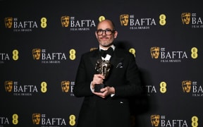 German director Edward Berger poses with the award for Best film for Conclave during the BAFTA British Academy Film Awards ceremony at the Royal Festival Hall, Southbank Centre, in London, on 16 February, 2025.