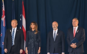 President Donald J. Trump waits with his wife, Melania, Pennsylvania Governor Tom Wolfe, and Interior Secretary Ryan Zinke before delivering a speech at the Flight 93 National Memorial commemorating the 17th Anniversary of the crash of Flight 93.