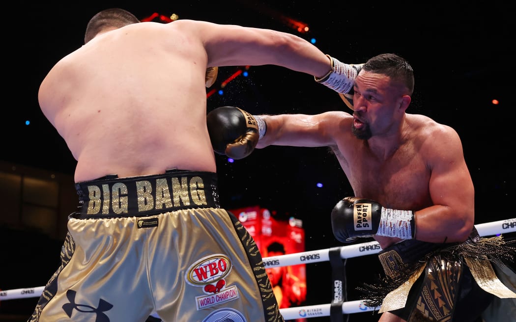 RIYADH, SAUDI ARABIA - MARCH 08: Zhilei Zhang and Joseph Parker exchange punches during the WBO Interim World Heavyweight title fight between Zhilei Zhang and Joseph Parker on the Knockout Chaos boxing card at the Kingdom Arena on March 08, 2024 in Riyadh, Saudi Arabia.