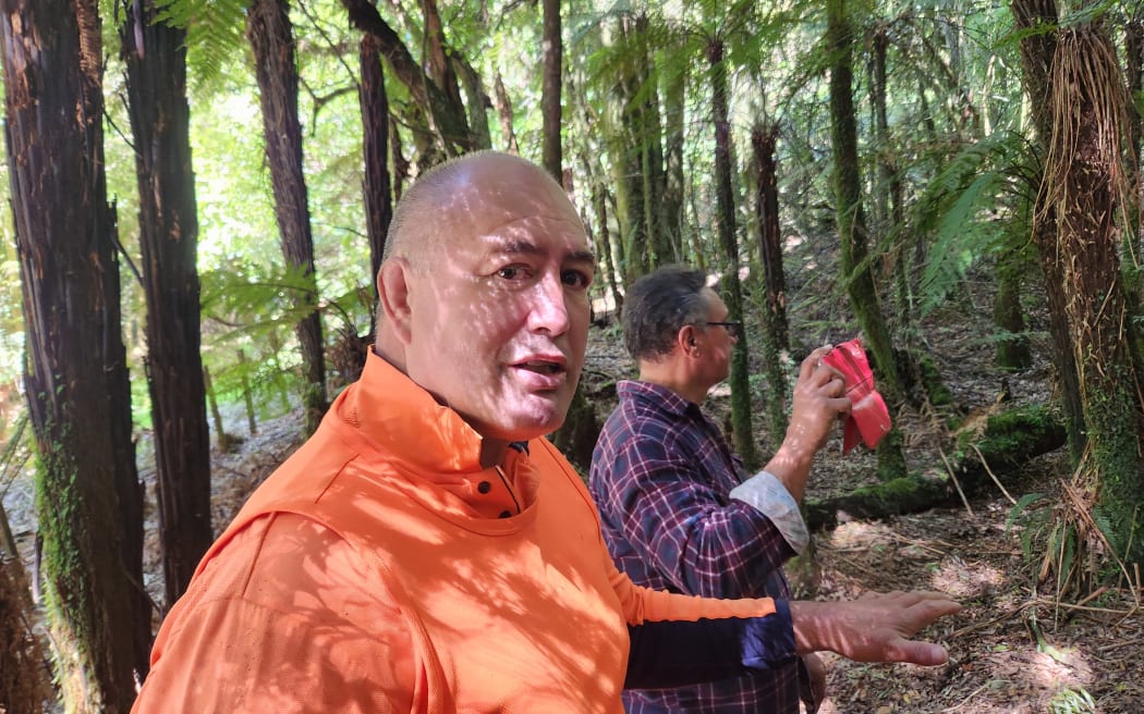 Charles Te Kowhai of Te Arawa Kāhui points our the dying forest due to pests like wallaby browsing on the understorey