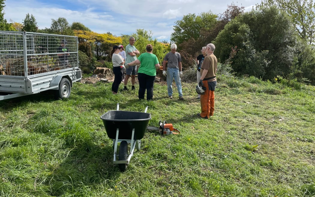 Volunteers working on the cleanup and clearing of the site of the Garden of Harmony extension in Methven ahead of planting in April.