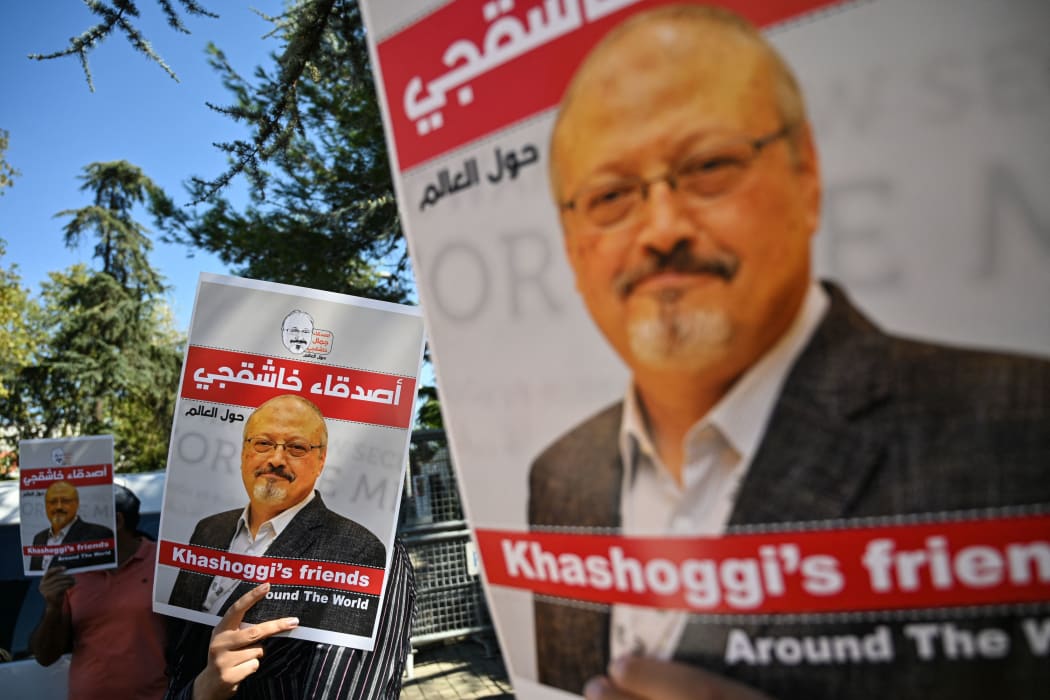Posters of murdered Saudi journalist Jamal Khashoggi at an event marking the anniversary of his assassination  in front of Saudi Arabia consulate, Istanbul, 2 October 2020.