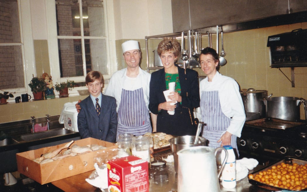 *Under embargo until 0001 BST, October 27, 2024*
This handout photograph released by Kensington Palace on October 25, 2024, shows Britain's Princess Diana (2R) with her 11-year-old son William (L), now Britain's Prince William, Prince of Wales in the kitchens during one of his first visits to homelessness charity, The Passage in London, taken on December 14, 1993. - "Prince William: We Can End Homelessness" – a two-part documentary series which follows the first year of The Prince’s Homewards programme  will be shown on ITV on Wednesday October, 30 and Thursday October 31, 2024. (Photo by THE PASSAGE / AFP) / NO USE AFTER DECEMBER 31, 2024 00:00:00 GMT - RESTRICTED TO EDITORIAL USE - MANDATORY CREDIT "AFP PHOTO / THE PASSAGE " - NO MARKETING - NO ADVERTISING CAMPAIGNS - NO DIGITAL ALTERATION ALLOWED  - DISTRIBUTED AS A SERVICE TO CLIENTS - NO ARCHIVE - NOT TO BE USED AFTER DECEMBER 31, 2024 / *Under embargo until 0001 BST, October 27, 2024*
