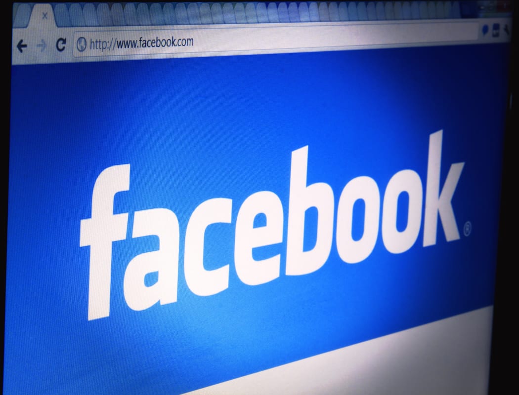 A file photo of the Facebook logo on a desktop computer
