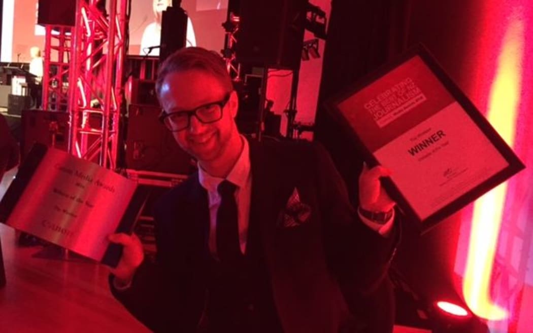 Marcus Stickley proudly displays the awards