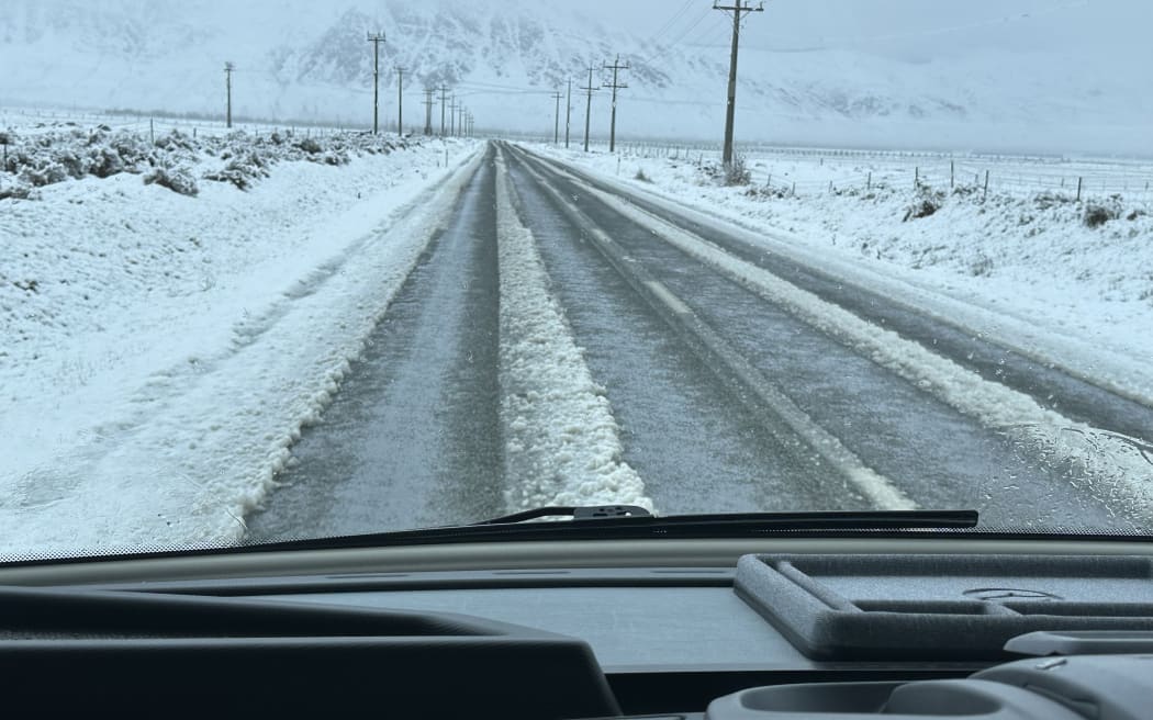 Snow on the road just beyond Kingston, near Lake Wakatipu, on 28 June, 2025, as low snow levels closed a handful of lower South Island highways.ur