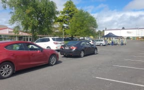 People arrive at a testing centre in Stratford after Covid-19 was detected in wastewater and people were urged to get tested.