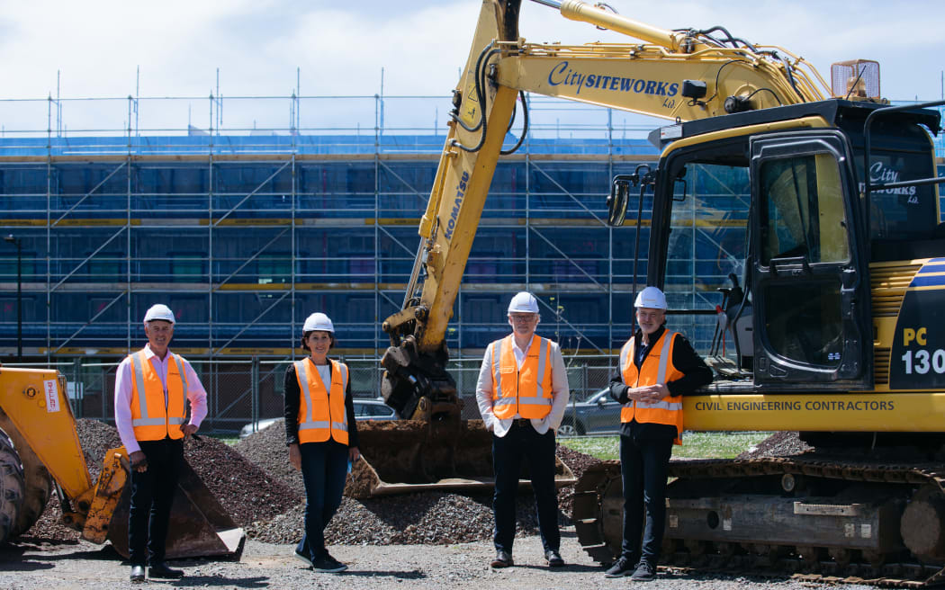 Simplicity Living directors (from left) Shane Brealey, Anna Brealey, Sam Stubbs, and Andrew Lance on site at the Hinaki Street development.