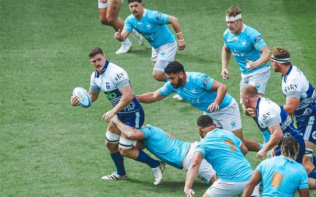 Blues captain Dalton Papali'i leads his side's attack against Moana Pasifika at Eden Park. March 2026