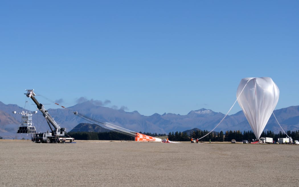 The balloon's objective is to detect ultra-high energy cosmic rays from beyond our galaxy as they penetrate the Earth’s atmosphere.