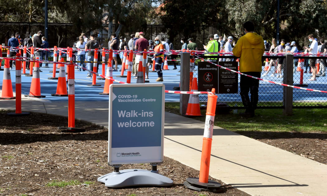 People queue at a Covid-19 vaccination centre in Melbourne on 1 September, 2021.