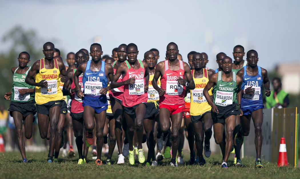 Athletes compete in the men's senior 10km marathon during the World Cross-County Championships in Kampala, Uganda.