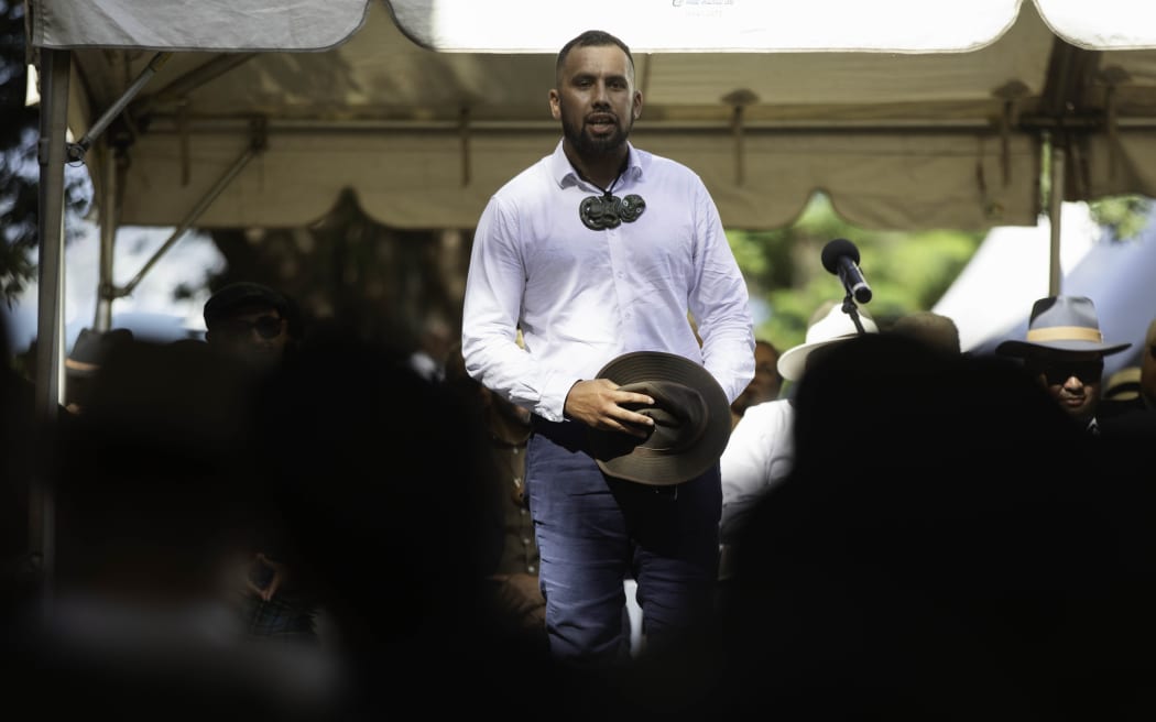 Rāniera Procter speaks as a delegation including representatives from Kīngitanga, Rātana, Parihaka and Te Pāti Māori is welcomed on to Te Whare Rūnanga at the Treaty grounds, on 4 February, 2024.
