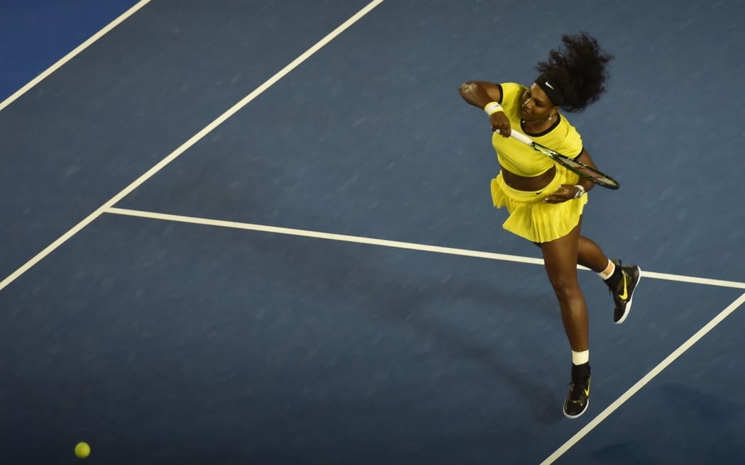 Serena Williams hits a return against Poland's Agnieszka Radwanska during their women's singles semi-final.
