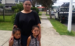 Maria Panapa with daughters, Zaraiyah-May, left, and Xzandra-Leigh in the Mangere street where a brawl broke out.