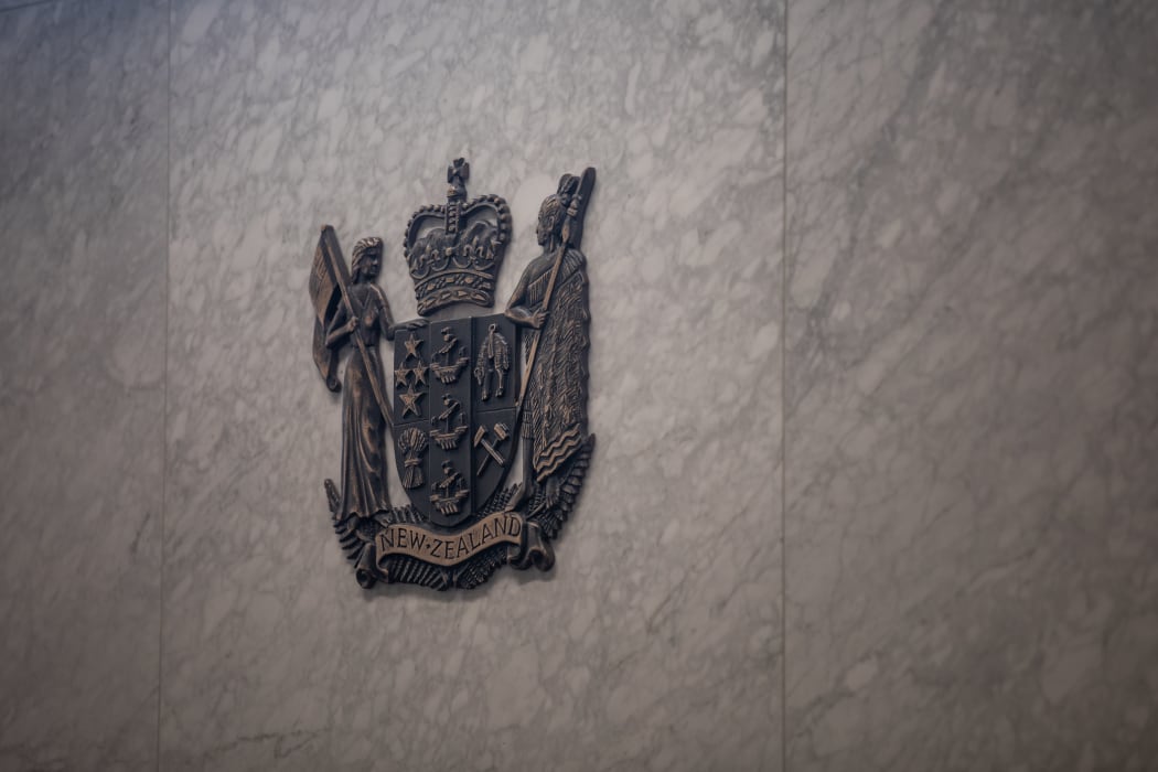Detail of the wall behind the judge in a court room at the Manukau District Court.