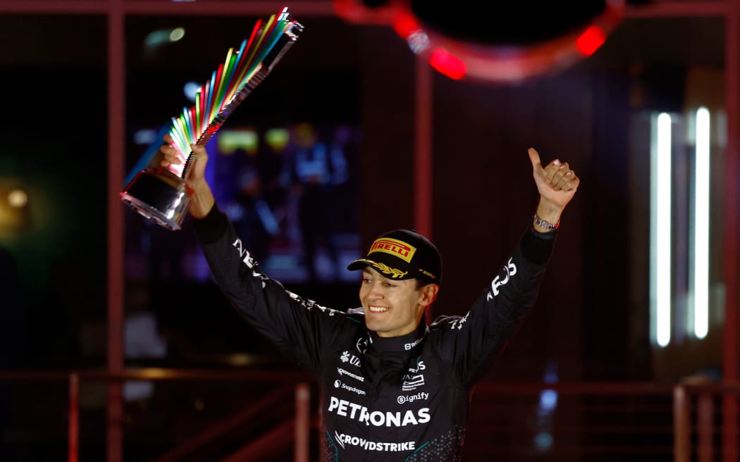 Mercedes driver George Russell celebrates his Las Vegas Grand Prix win, 2024.