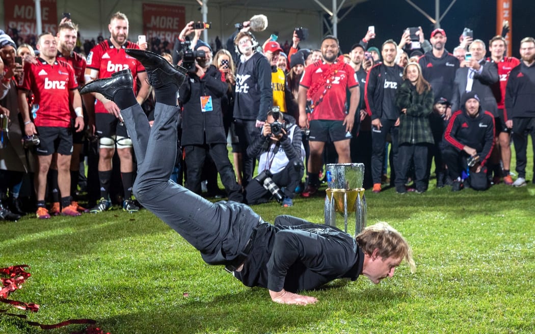 Crusaders coach Scott Robertson displays his trademark breakdancing routine after the Crusaders' 19-3 win over the Jaguares in the Super Rugby final.