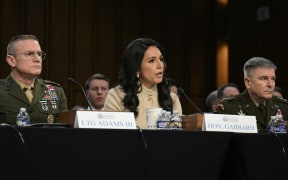 (L/R) Director of Defense Intelligence Agency (DIA) James Adams III, US Director of National Intelligence Tulsi Gabbard, and Acting Commander of US Cyber Command William Hartman testify during a Senate Committee on Intelligence hearing to examine worldwide threats, on Capitol Hill in Washington, DC, on March 18, 2026. (Photo by Oliver Contreras / AFP)