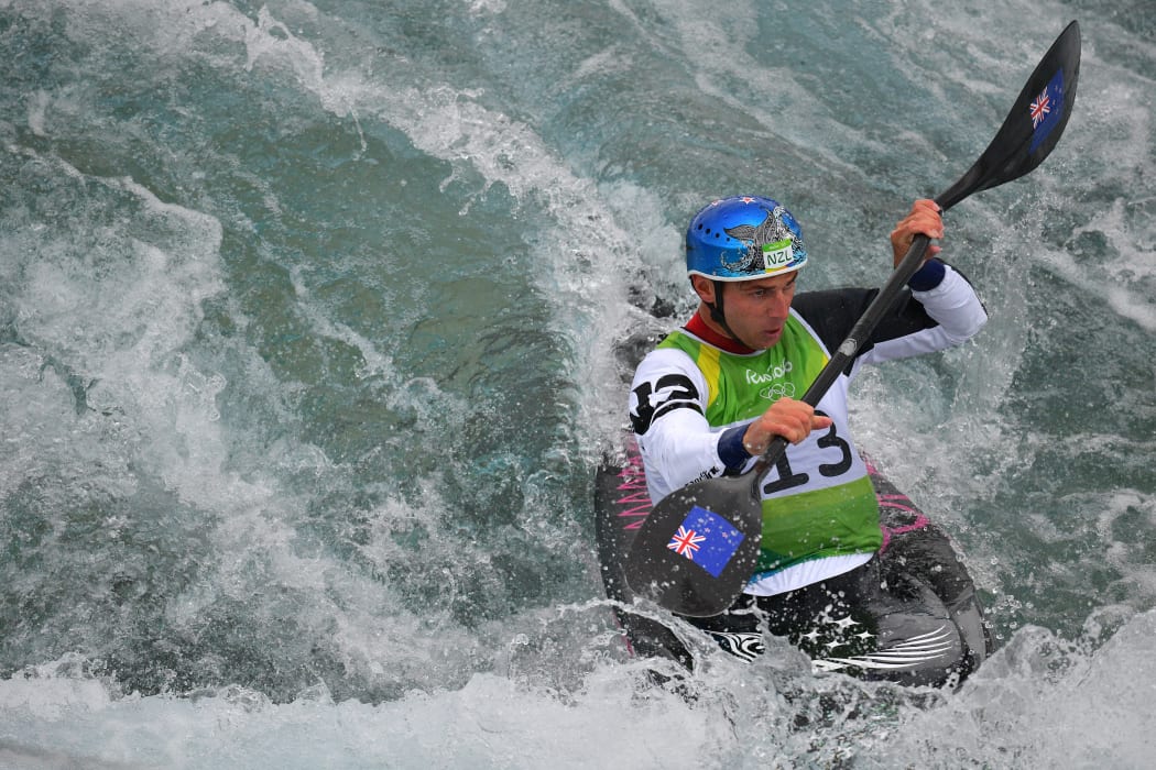 Mike Dawson competes in the canoe slalom at the Olympic Games.