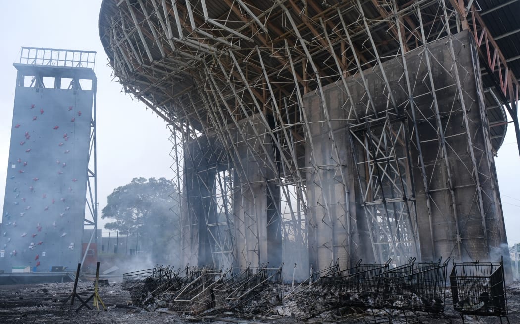 A burnt climbing wall is pictured in the Magenta district of Noumea on May 15, 2024 amid protests linked to a debate on a constitutional bill aimed at enlarging the electorate for upcoming elections of the overseas French territory of New Caledonia.