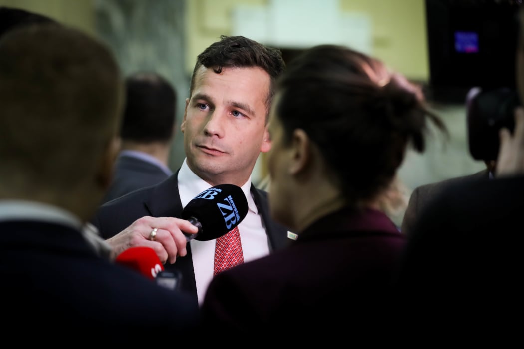 ACT party leader David Seymour answers media questions before heading in to the debating chamber.
