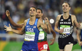 Nick Willis crosses the line in third place in the men's 1500 metre final at the Rio Olympics, behind gold winner Matt Centrowitz of the USA.