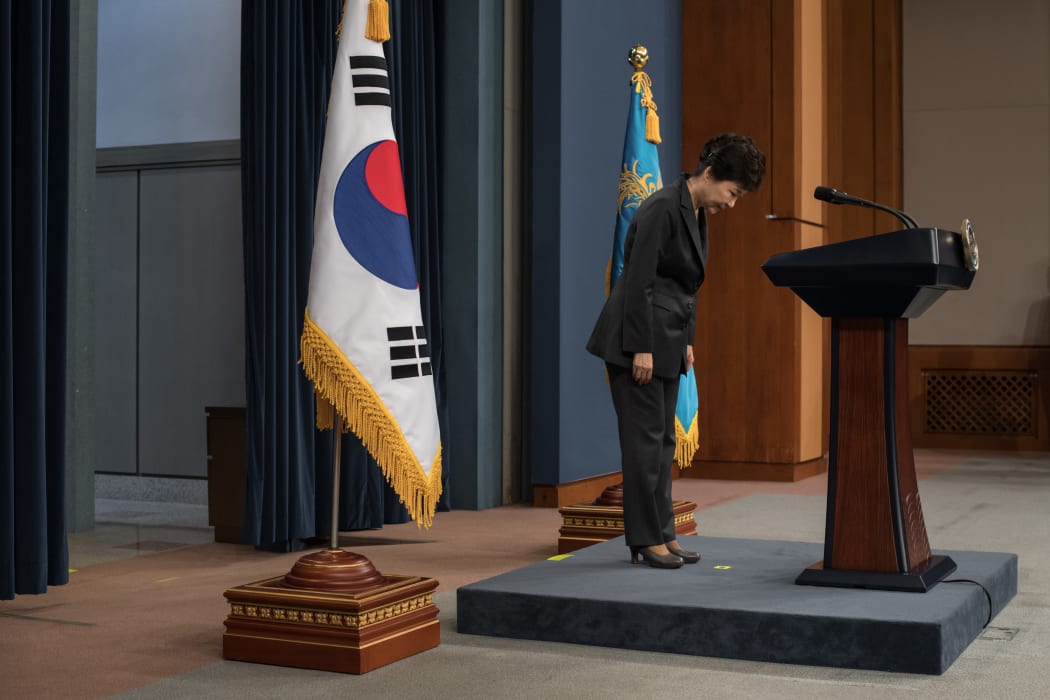 South Korea's President Park Geun-Hye bows prior to delivering an address to the nation at the presidential Blue House in Seoul after the impeachment was upheld.