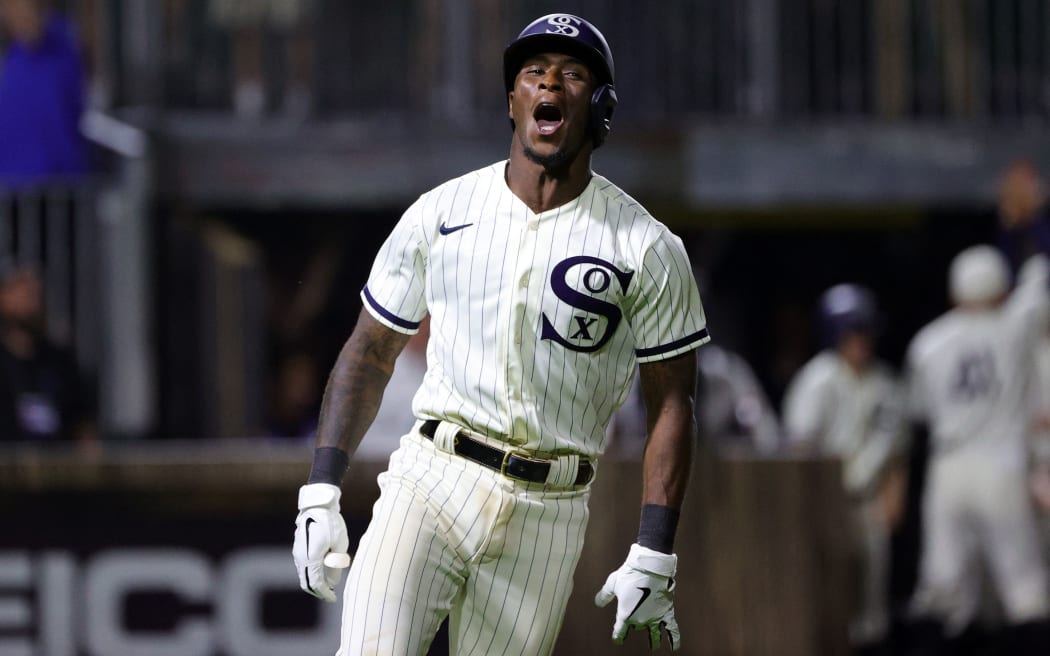 Tim Anderson #7 of the Chicago White Sox celebrates a walk off two run home run during the ninth inning against the New York Yankees at the Field of Dreams on August 12, 2021 in Dyersville, Iowa.