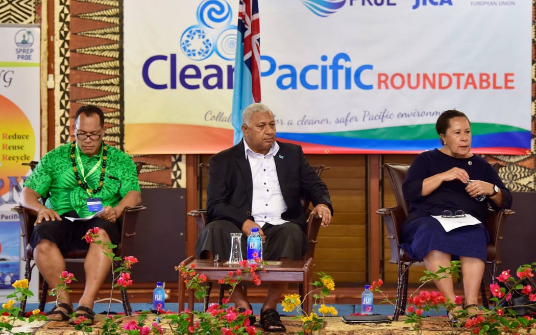SPREP Director General, Kosi Latu (L), Fiji's Prime Minister Frank Bainimarama (C), Pacific Islands Forum Secretary-General Dame Meg Taylor (R) at the opening of the Clean Pacific Roundtable in Suva, August 2018