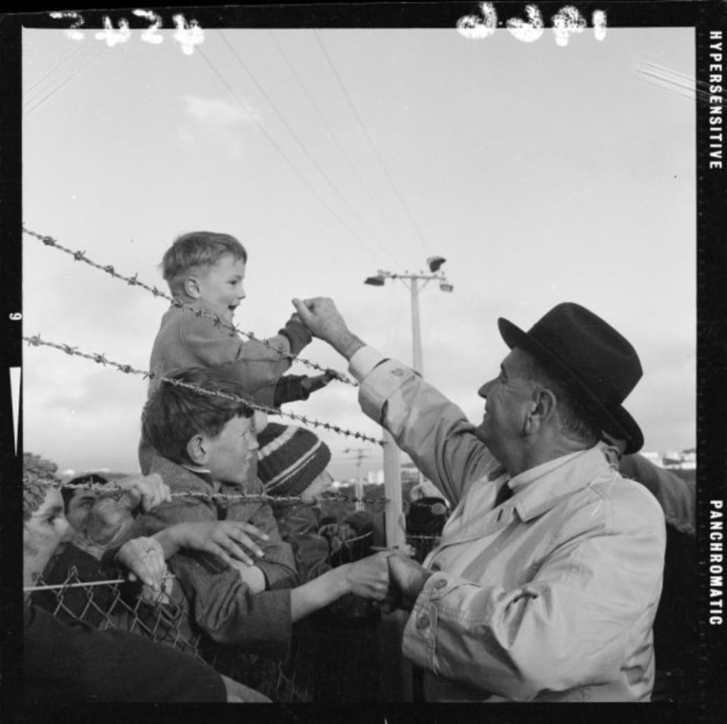 President Johnson greeting child Clem Thorn among the crowd at Wellington Airport in 1966.