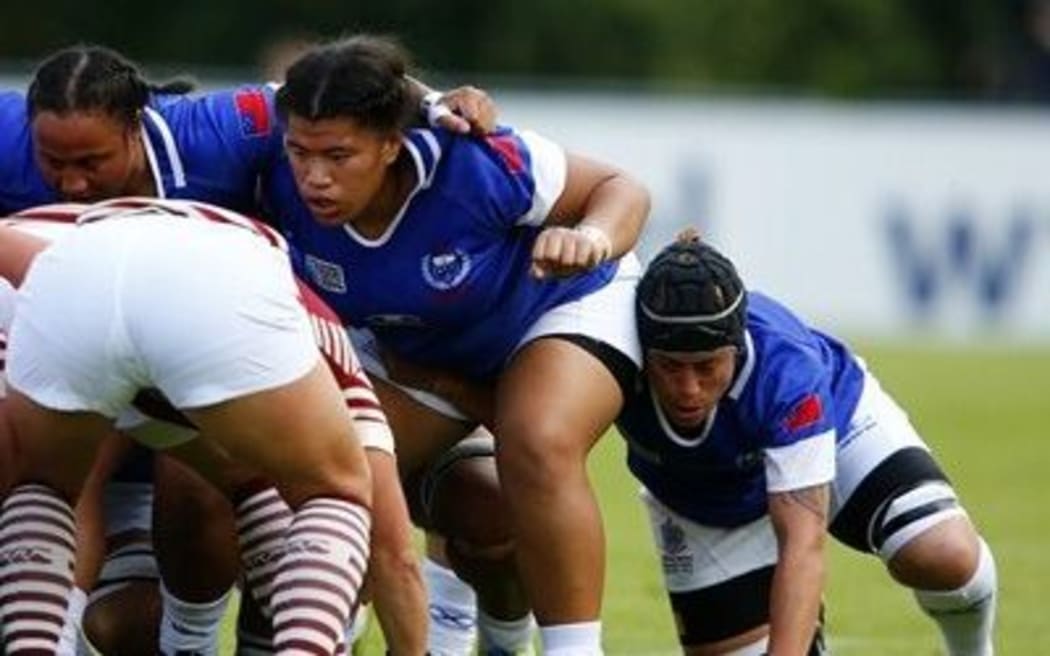 Samoa Manusina vs. England at the 2014 RWC in Paris.