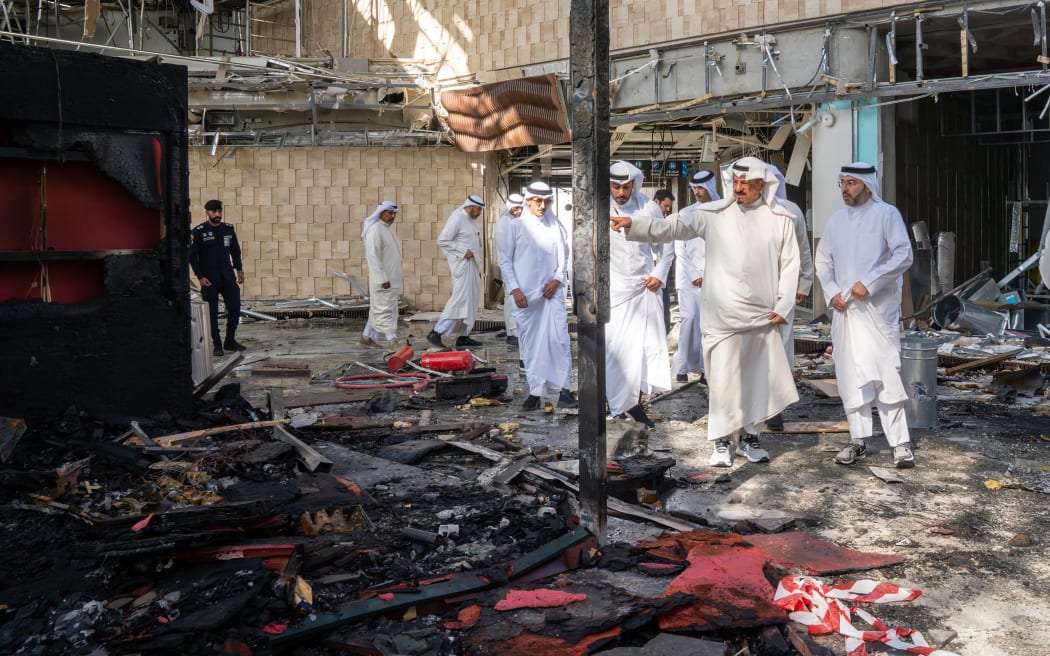 This handout photo provided by the Kuwaiti News Agency (KUNA) on June 3, 2026 shows Kuwaiti Prime Minister Sheikh Ahmad al-Abdullah al-Sabah (2R) inspecting the damaged airport after an Iranian attack, in Kuwait City. Kuwait demanded that two Iranian embassy staff leave the country within 24 hours on June 3 after an Iranian attack on the country’s airport that killed one person and injured dozens more. (Photo by KUNA / AFP) / RESTRICTED TO EDITORIAL USE - MANDATORY CREDIT “AFP PHOTO / KUWAITI NEWS AGENCY (KUNA) / HANDOUT / - NO MARKETING NO ADVERTISING CAMPAIGNS - DISTRIBUTED AS A SERVICE TO CLIENTS