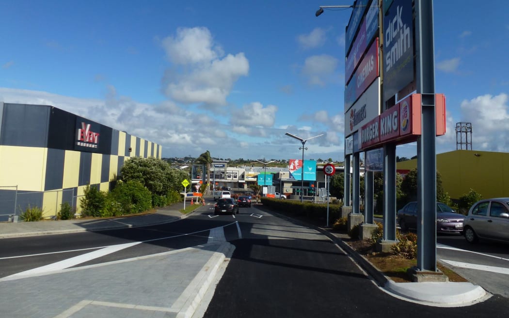 Auckland Transport says the sign's steel supports are in the path of traffic crossing the intersection, and that lane is closed until it's moved.