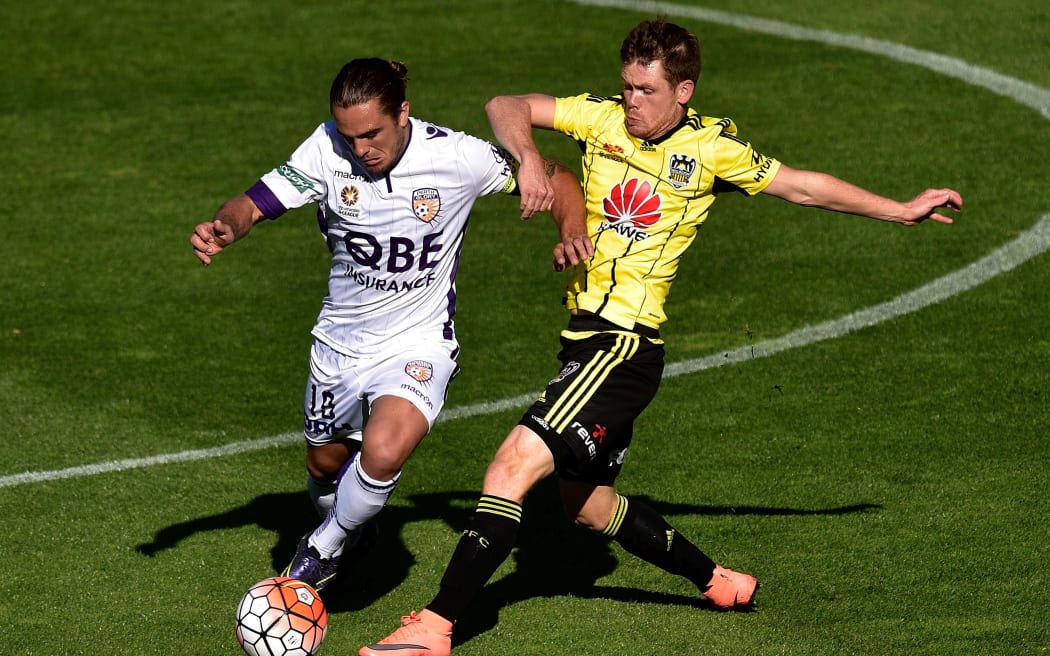 Phoenix midfielder Michael McGlinchey in action against Perth Glory.