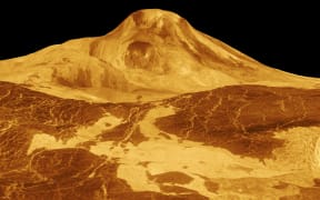 Image of the second highest mountain and highest volcano of Venus, the 8-km-high volcano Maat Mons. Based on Magellan radar images. In the foreground, long lava flows are visible.