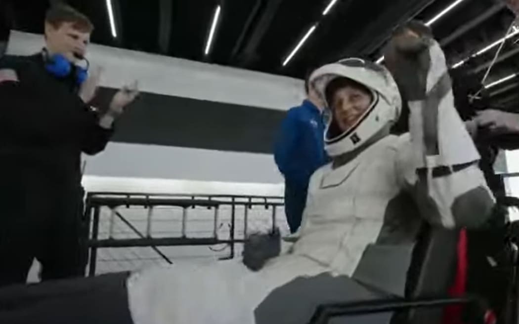 Suni Williams is wheeled out of the SpaceX pod and onto the recovery vessel