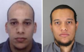 Handout photos released by French police show suspects Cherif Kouachi (L), aged 32, and his brother Said Kouachi (R), aged 34.