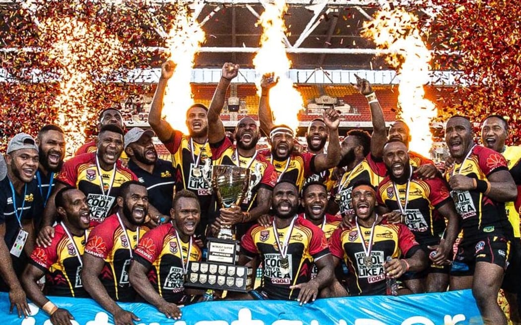 The PNG Hunters celebrate winning the Intrust Super Cup.