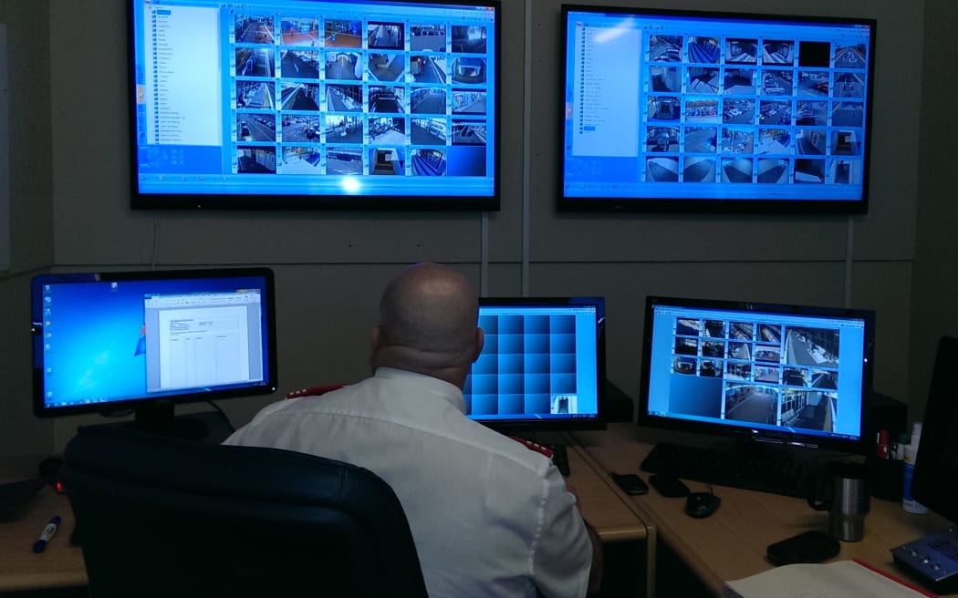 Security guard John Donaldson monitors CCTV footage from the region's trains.